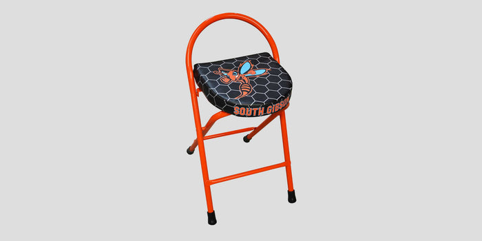 Orange folding stool with a black hexagonal pattern seat featuring a blue and orange hornet logo.