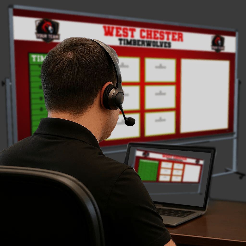 Back view of a customer support representative wearing a headset while assisting with the design of a custom West Chester Timberwolves football whiteboard, shown on a laptop and a large screen.