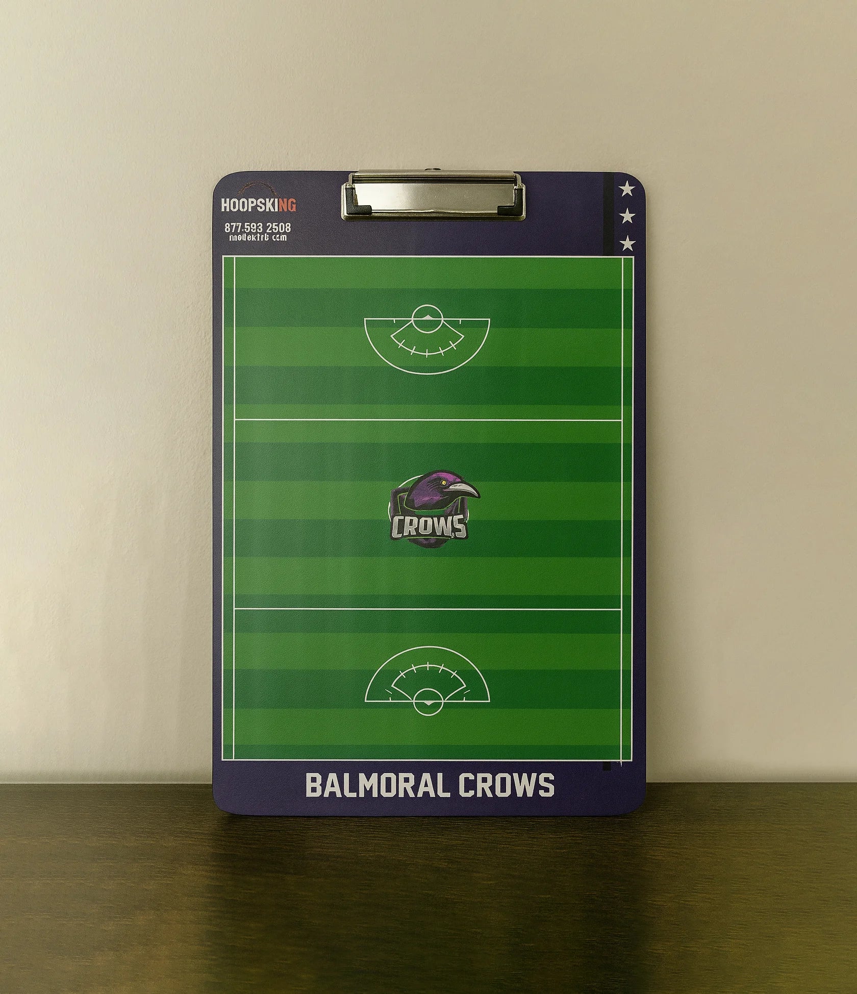 Double-sided custom lacrosse clipboard showing offensive and defensive play layouts.
