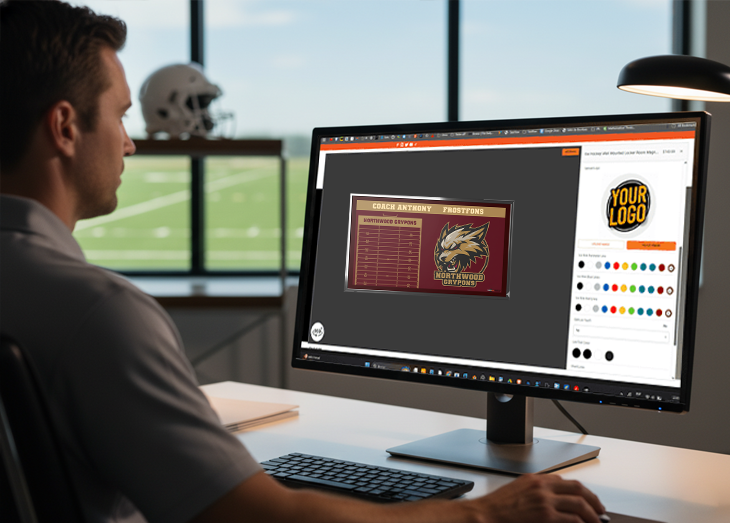 A man in a professional office setting designs the 'Sterling Sentinels' team logo on a computer. The webpage section is titled 'The 3D Command Center: Design Your Legacy,' promoting a design tool for creating team icons, with a call-to-action to a Shopify App.