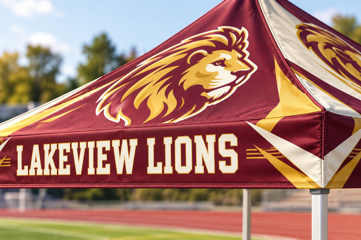 Custom school mascot and lettering printed on canopy roof and valance fabric.