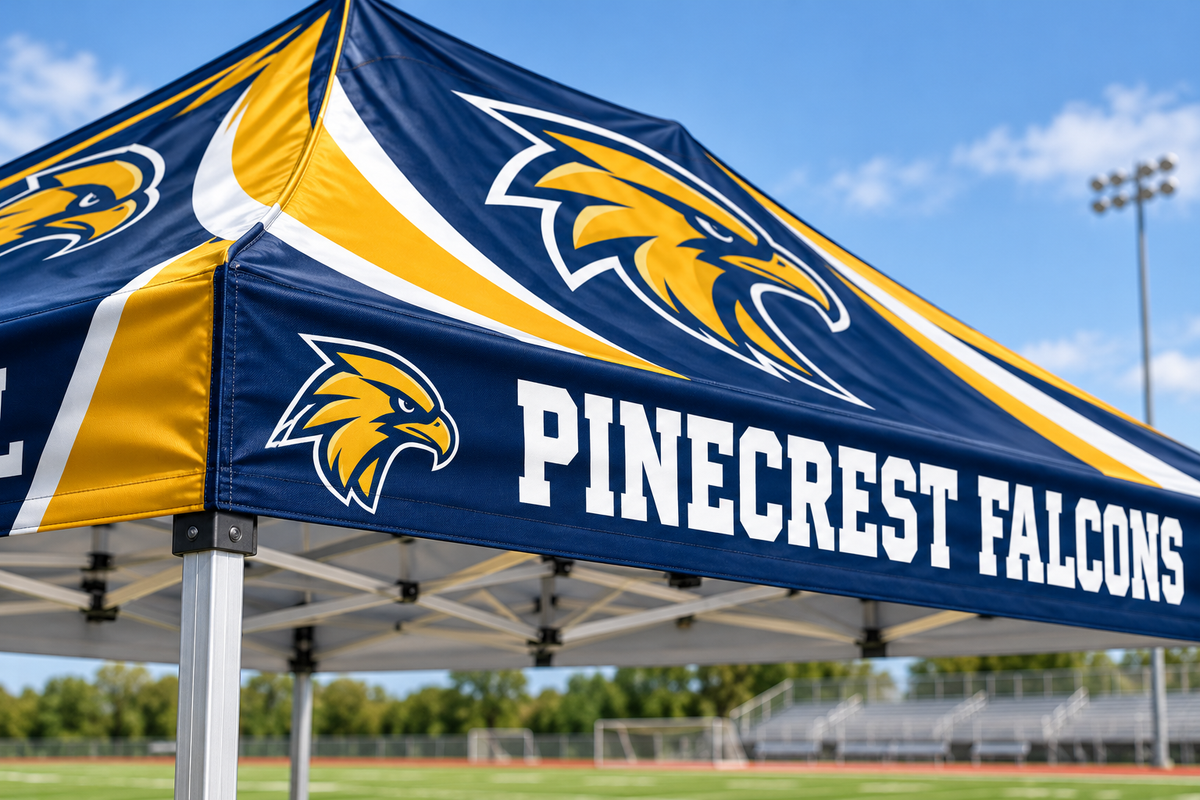 Custom school mascot and lettering printed on canopy roof and valance fabric.