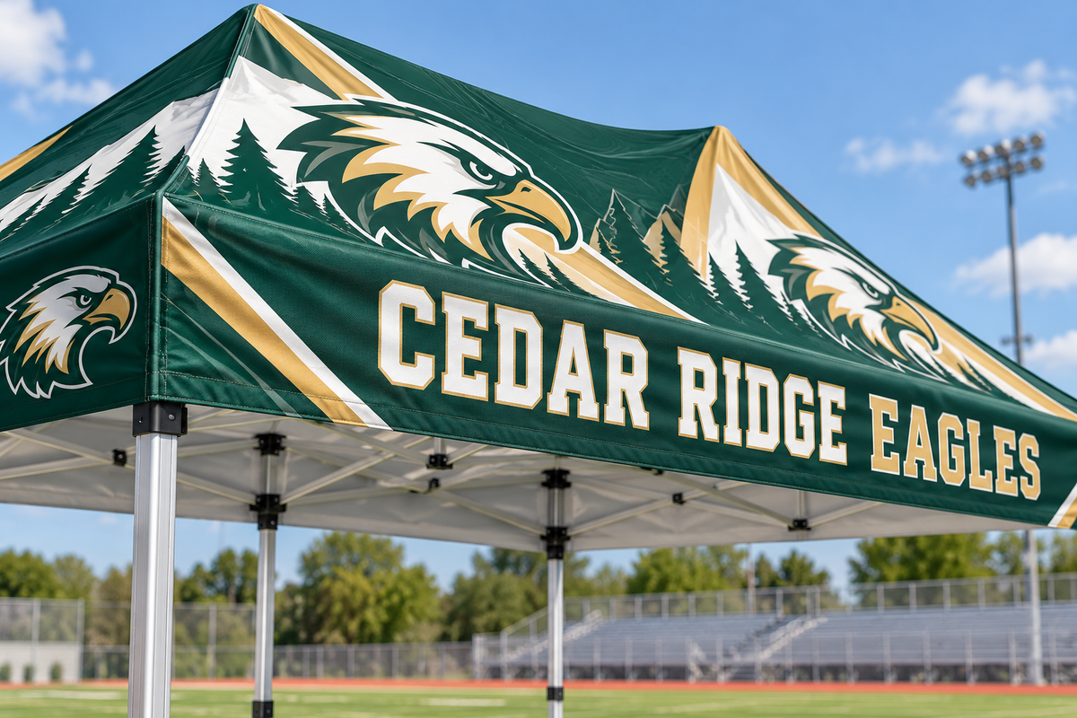 Custom school mascot and lettering printed on canopy roof and valance fabric.