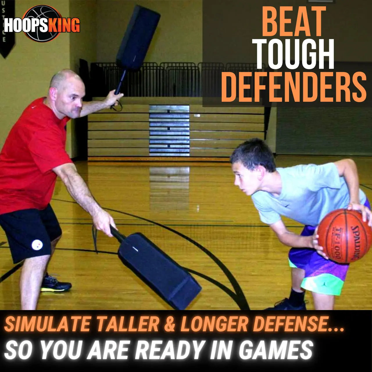 Basketball pads for drills. The drive is challenged right away so the player has to protect the ball.