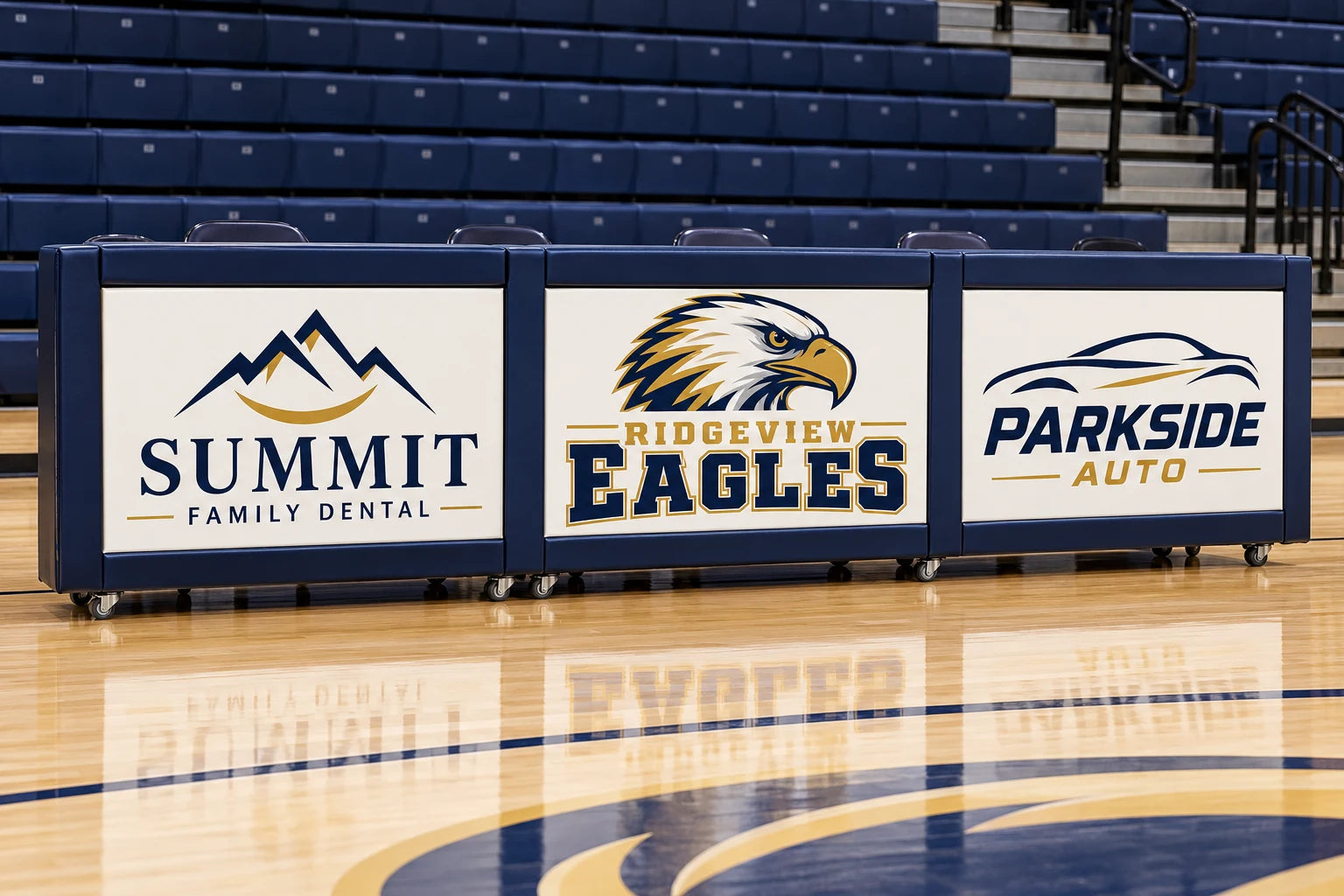 Navy custom scorers table design concept with Ridgeview Eagles branding between fictional local sponsor panels