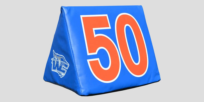 Custom football sideline yard markers set up on a youth football field