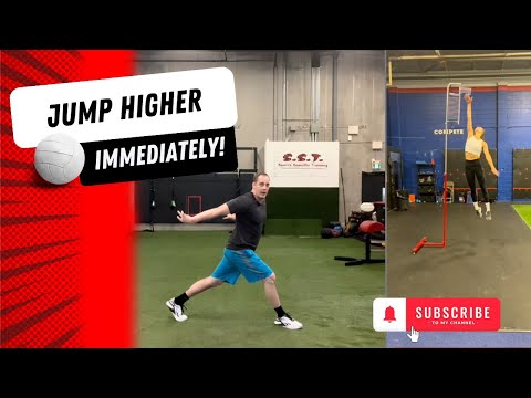 Volleyball hitter approaching and jumping to spike the ball over the net
