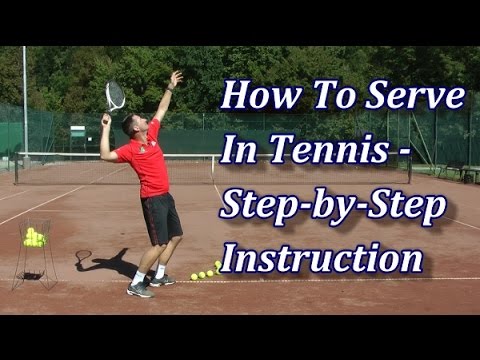 Tennis player driving up into a powerful serve
