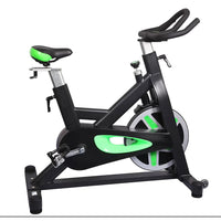Thumbnail for Black stationary exercise bike with green accents on the seat, flywheel, and frame.