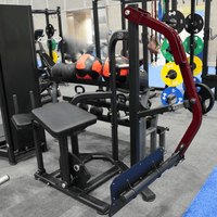 Thumbnail for Black and red plate-loaded glute kickback machine in a gym setting.