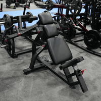 Thumbnail for Black plate-loaded incline pec fly machine with adjustable seat in a gym setting.