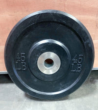 Thumbnail for Black 45 LB bumper plate with a steel center hub.