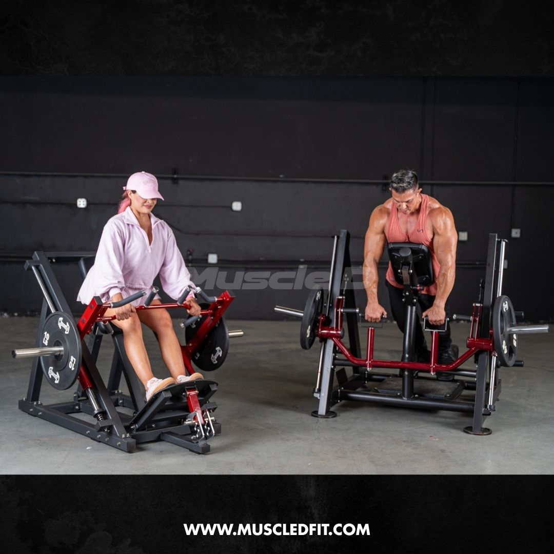 Man and woman using two chest-supported linear bearing row machines in a gym.