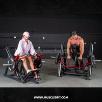 Thumbnail for Man and woman using two chest-supported linear bearing row machines in a gym.