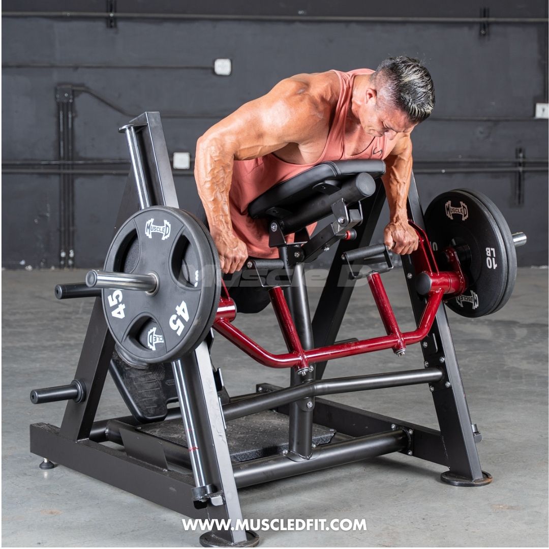 Man using a chest-supported linear bearing row machine with weight plates.