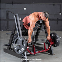 Thumbnail for Man performing a chest-supported row exercise on a linear bearing row machine with weight plates.