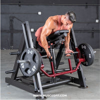 Thumbnail for Man using a chest-supported linear bearing row machine with weight plates.