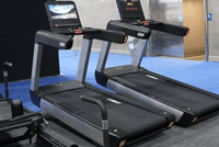 Thumbnail for Two V2 Touch Screen Commercial Treadmills with black belts and gray frames.