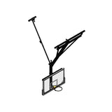 Ceiling-hung basketball backstop with a clear backboard, black rim, and a folding support structure.