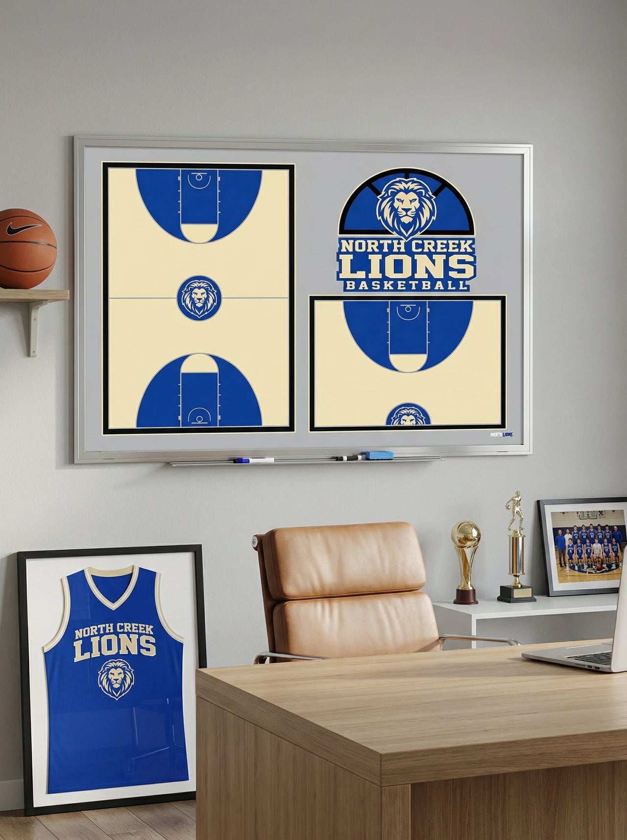 Whiteboard with basketball court diagrams and "North Creek Lions Basketball" logo, in an office setting.