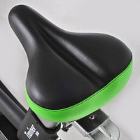 Thumbnail for Black and green padded exercise bike seat.