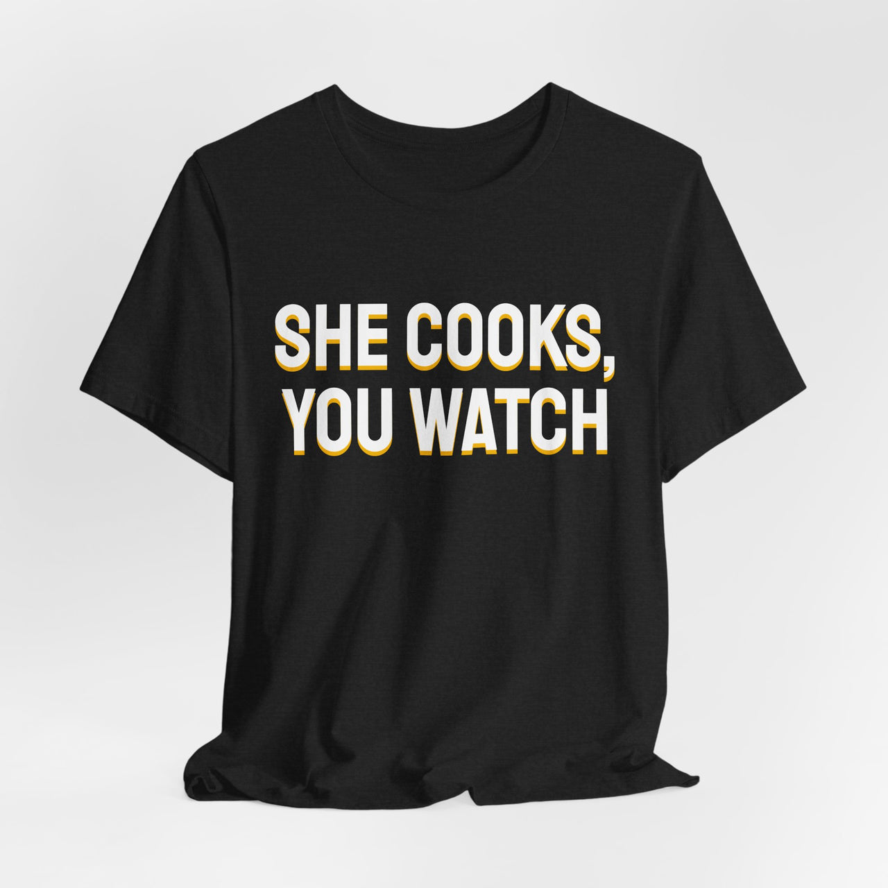 She Cooks, You Watch — Basketball T-Shirt