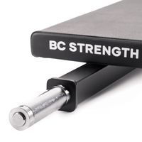Thumbnail for BC Strength Rotisserie Bar hip thrust bar with integrated back pad and rotating sleeves