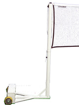 White portable badminton net system with a net attached to a pole and a wheeled base.
