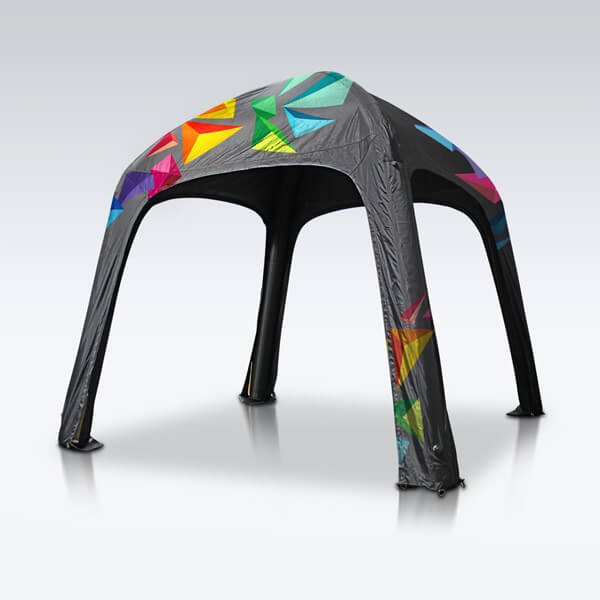 Gray inflatable tent with colorful geometric patterns on the canopy and legs.