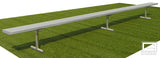 Long silver portable bench with three supports on green turf.