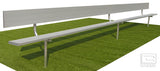 Long silver metal bench with a backrest, on green artificial turf.