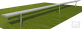 Long aluminum inground bench on green artificial turf.