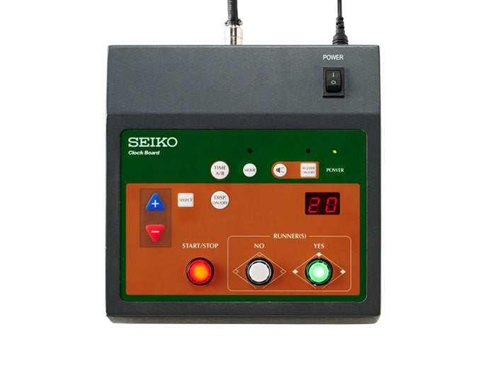 Seiko Clock Board with green and orange face, red digital display showing "20", and various buttons.