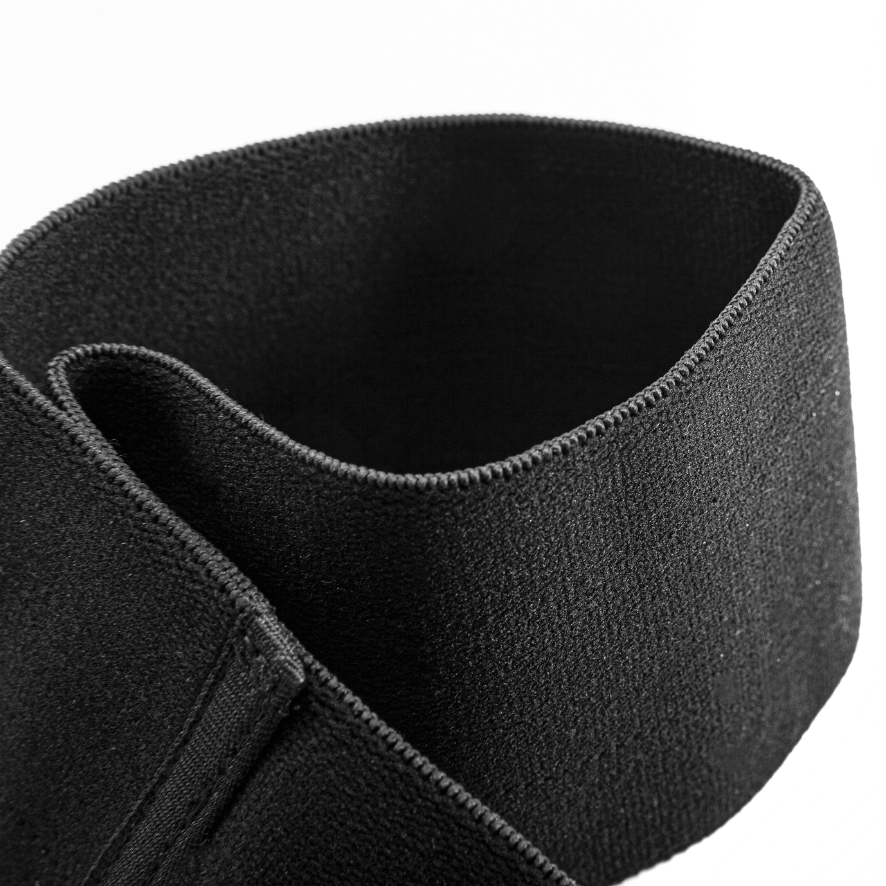 BC Strength Backstage Booty Band foot-loop resistance band for a tan-safe glute pump