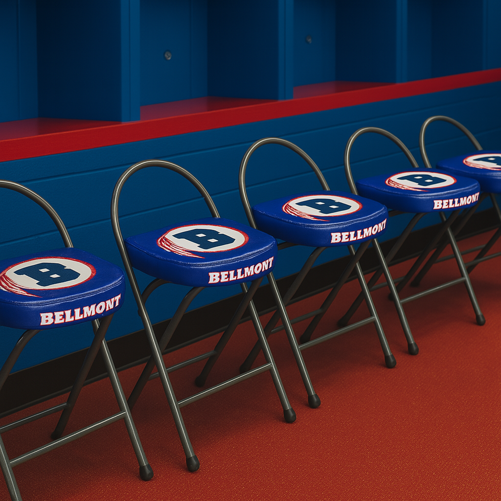 Row of blue locker room stools with "Bellmont" logo, red floor, and blue lockers in background.