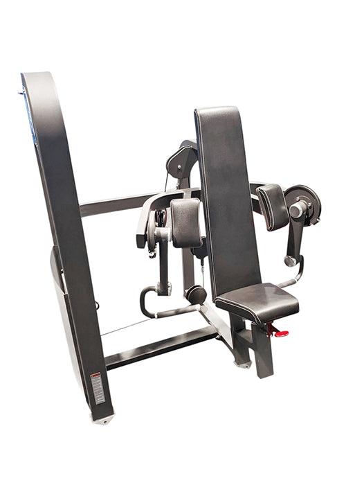 Gray biceps curl machine with black padded seat, backrest, and armrests, on a white background.