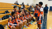 Thumbnail for Basketball players wearing custom orange and navy arm sleeves with a panther logo.
