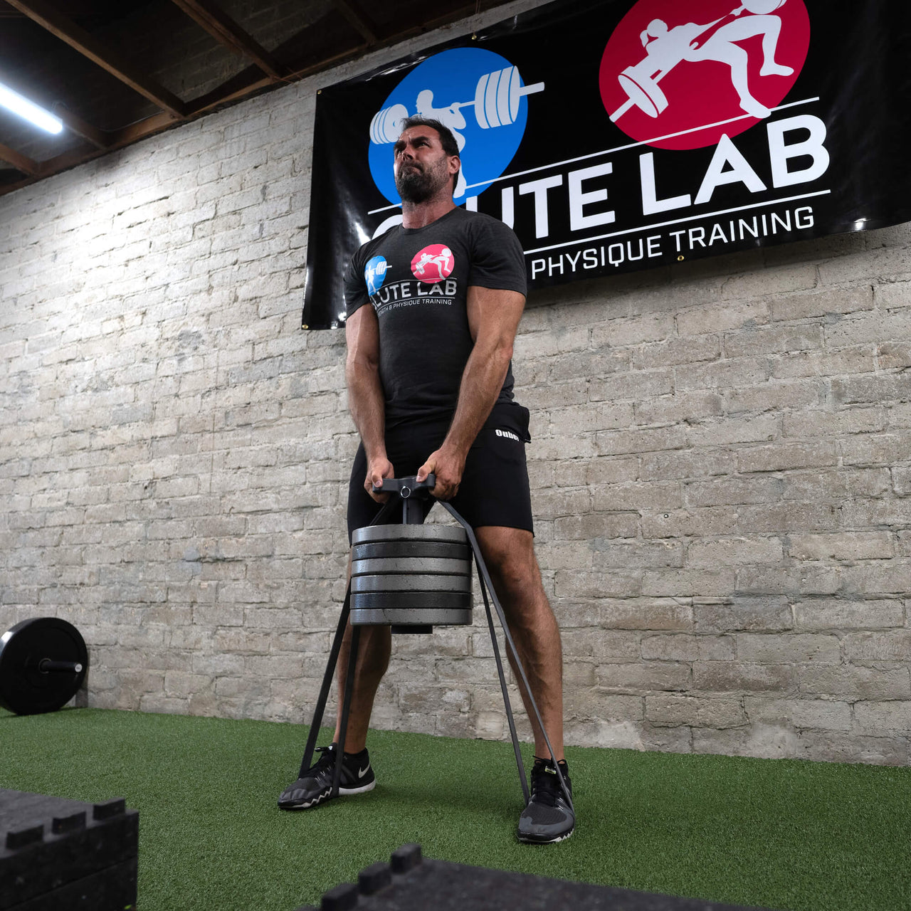 BC Strength T-Bell plate-loaded training tool with prone and neutral grip handles