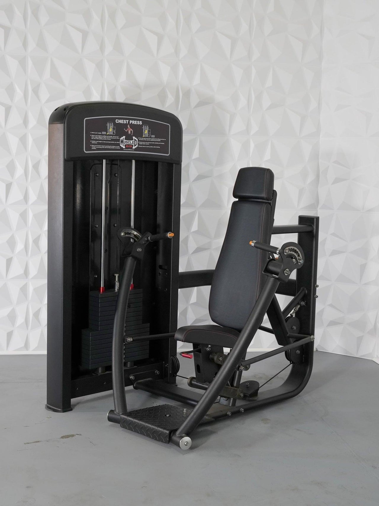 Black commercial chest press machine with adjustable seat and pin-selectorized weight stack.