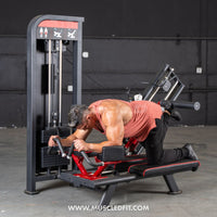 Thumbnail for Man using a black and red selectorized glute kick machine in a gym.
