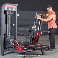 Thumbnail for Man adjusting a black and red glute kick machine with weight stack in a gym.