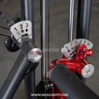 Thumbnail for Close-up of a gym machine's adjustment mechanisms, one gray with settings 1-3, one red with settings 1-6.