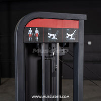 Thumbnail for Close-up of a black glute kick machine with exercise instructions and muscle diagrams on a red panel.