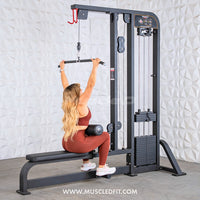 Thumbnail for Woman using a black lat pulldown/low row combo machine with a weight stack.