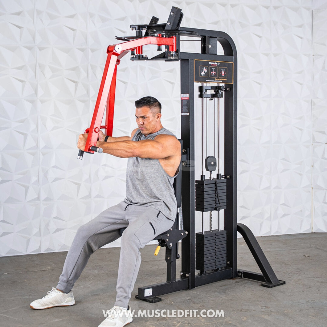 Man using a black and red pec/rear delt combo machine, performing a chest fly exercise.