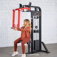 Thumbnail for Woman using a black and red pec/rear delt combo machine with weight stack.