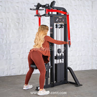 Thumbnail for Woman with long blonde hair using a black and red pec/rear delt combo machine.