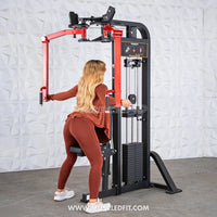 Thumbnail for Woman with long blonde hair using a black and red pec/rear delt combo machine.