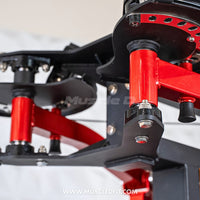 Thumbnail for Close-up of red and black fitness machine components, showing bolts, nuts, and a 