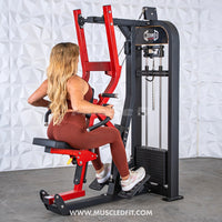 Thumbnail for Woman using a red and black selectorized seated row machine with multi-grip handles and a weight stack.